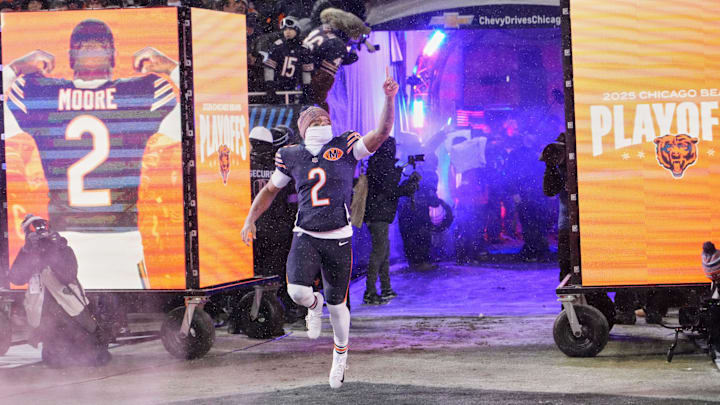 Jan 18, 2026; Chicago, IL, USA; Chicago Bears wide receiver DJ Moore (2) runs onto the field during player introductions before a NFC Divisional Round game against the Los Angeles Rams at Soldier Field. Mandatory Credit: David Banks-Imagn Images