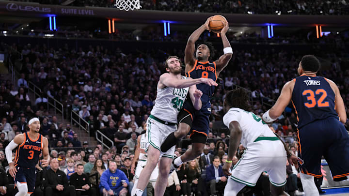 New York Knicks forward OG Anunoby shoots the ball while being defended by Boston Celtics center Luke Kornet. Mandatory Credit: John Jones-Imagn Images