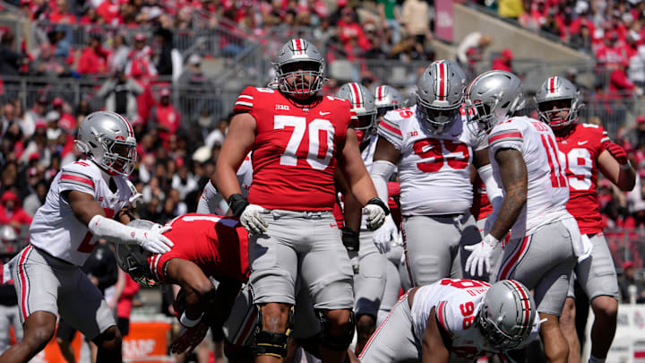 April 13, 2024; Columbus, Ohio, USA; 
Ohio State Buckeyes offensive lineman Josh Fryar (70) competes