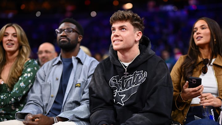 Feb 11, 2025; Philadelphia, Pennsylvania, USA; Philadelphia Eagles Cooper DeJean looks on during the game between the Philadelphia 76ers and the Toronto Raptors at Wells Fargo Center. Feb 11, 2025; Philadelphia, Pennsylvania, USA; Philadelphia Eagles Cooper DeJean looks on during the game between the Philadelphia 76ers and the Toronto Raptors at Wells Fargo Center.