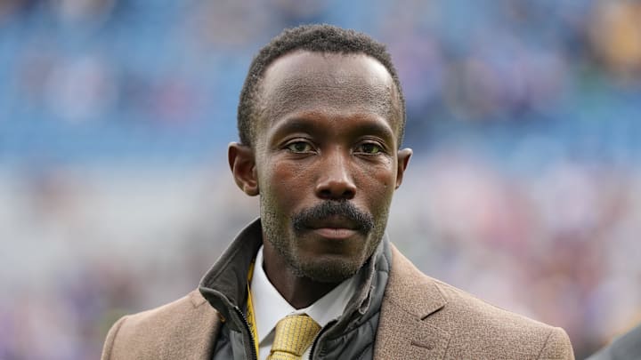 Sep 28, 2025; Dublin, Ireland; Minnesota Vikings general manager Kwesi Adofo-Mensah stands on the sidelines prior to a game against the Pittsburgh Steelers during an NFL International Series game at Croke Park. Mandatory Credit: Kirby Lee-Imagn Images
