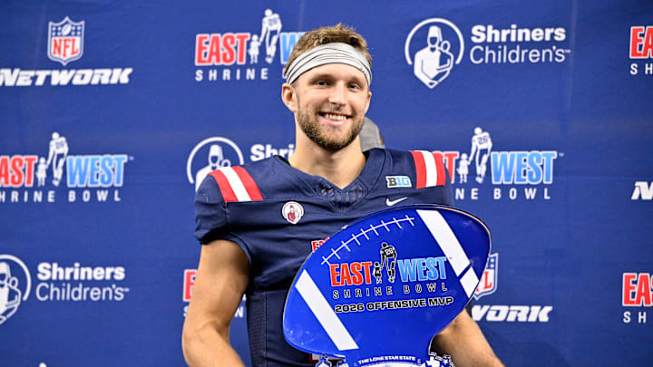 Jan 27, 2026; Frisco, TX, USA; West quarterback Mark Gronowski (11) holds the offensive MVP trophy after the game at the Ford Center at the Star. Mandatory Credit: Jerome Miron-Imagn Images Jan 27, 2026; Frisco, TX, USA; West quarterback Mark Gronowski (11) holds the offensive MVP trophy after the game at the Ford Center at the Star. Mandatory Credit: Jerome Miron-Imagn Images