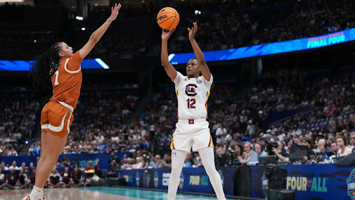 Apr 4, 2025; Tampa, FL, USA; South Carolina Gamecocks guard MiLaysia Fulwiley (12) shoots against Texas Longhorns guard Jordan Lee (7) during the first quarter in a semifinal of the women's 2025 NCAA tournament at Amalie Arena. Mandatory Credit: Kirby Lee-Imagn Images Apr 4, 2025; Tampa, FL, USA; South Carolina Gamecocks guard MiLaysia Fulwiley (12) shoots against Texas Longhorns guard Jordan Lee (7) during the first quarter in a semifinal of the women's 2025 NCAA tournament at Amalie Arena. Mandatory Credit: Kirby Lee-Imagn Images