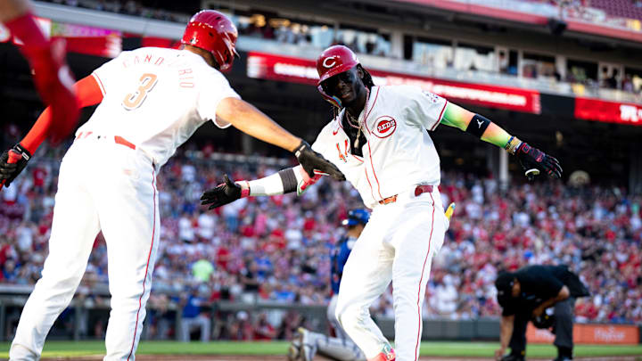 Cincinnati Reds shortstop Elly De La Cruz (44) celebrates with Cincinnati Reds third baseman Jeimer Candelario (3) after hitting a 3-run home run to take a one run lead in the third inning of the MLB game against the Chicago Cubs at Great American Ball Park in Cincinnati on Thursday, June 6, 2024. Cincinnati Reds shortstop Elly De La Cruz (44) celebrates with Cincinnati Reds third baseman Jeimer Candelario (3) after hitting a 3-run home run to take a one run lead in the third inning of the MLB game against the Chicago Cubs at Great American Ball Park in Cincinnati on Thursday, June 6, 2024.