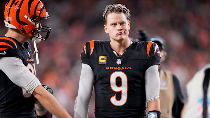 Cincinnati Bengals quarterback Joe Burrow (9) celebrates after the game-winning touchdown pass to Tee Higgins in overtime of the NFL Week 17 game between the Cincinnati Bengals and the Denver Broncos at Paycor Stadium in downtown Cincinnati on Saturday, Dec. 28, 2024. The Bengals took a 30-24 win in overtime to remain in the post season chase.