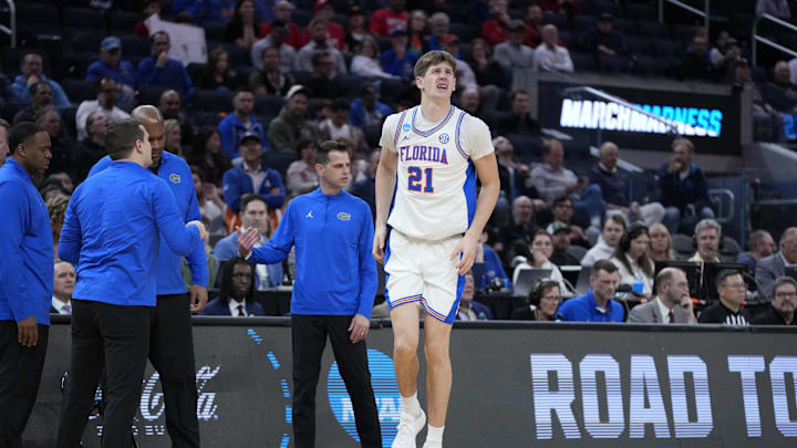 Mar 27, 2025; San Francisco, CA, USA; Florida Gators forward Alex Condon (21) limps back to the Florida Gators bench during the first half against the Maryland Terrapins during a West Regional semifinal of the 2025 NCAA tournament at Chase Center. Mandatory Credit: Kyle Terada-Imagn Images