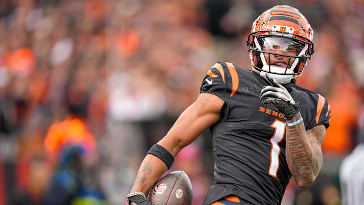 Cincinnati Bengals wide receiver Ja'Marr Chase (1) smiles after completing a deep pass in the first quarter of the NFL Week 15 game between the Cincinnati Bengals and the Minnesota Vikings at PayCor Stadium in downtown Cincinnati on Saturday, Dec. 16, 2023.