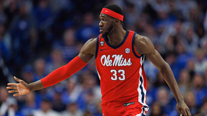 Feb 13, 2024; Lexington, Kentucky, USA; Ole Miss Rebels forward Moussa Cisse (33) celebrates a