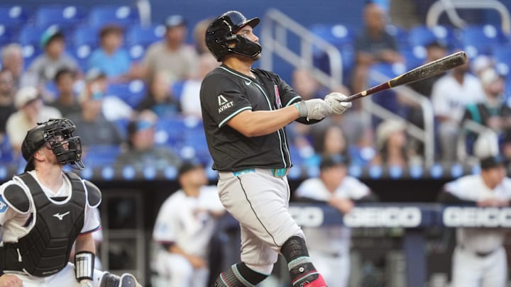 Apr 16, 2025; Miami, Florida, USA; Arizona Diamondbacks first baseman Josh Naylor (22) watches his home run leave the park against the Miami Marlins in the second inning at loanDepot Park. Mandatory Credit: Jim Rassol-Imagn Images Apr 16, 2025; Miami, Florida, USA; Arizona Diamondbacks first baseman Josh Naylor (22) watches his home run leave the park against the Miami Marlins in the second inning at loanDepot Park. Mandatory Credit: Jim Rassol-Imagn Images