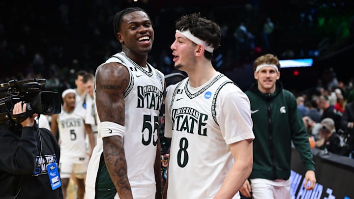 Mar 23, 2025; Cleveland, OH, USA; Michigan State Spartans forward Coen Carr (55) celebrates with forward Frankie Fidler (8) after the game against the New Mexico Lobos during the NCAA Tournament Second Round at Rocket Arena. Mandatory Credit: Ken Blaze-Imagn Images