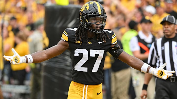 Sep 14, 2024; Iowa City, Iowa, USA; Iowa Hawkeyes defensive back Jermari Harris (27) reacts after scoring a 28 yard interception return for touchdown against the Troy Trojans during the third quarter at Kinnick Stadium. Mandatory Credit: Jeffrey Becker-Imagn Images