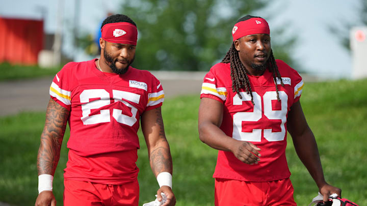 Jul 22, 2025; St. Joseph, MO, USA; Kansas City Chiefs running backs Elijah Mitchell (25) and Kareem Hunt (29) walk down the hill to the fields prior to training camp at Missouri Western State University. Mandatory Credit: Denny Medley-Imagn Images Jul 22, 2025; St. Joseph, MO, USA; Kansas City Chiefs running backs Elijah Mitchell (25) and Kareem Hunt (29) walk down the hill to the fields prior to training camp at Missouri Western State University. Mandatory Credit: Denny Medley-Imagn Images