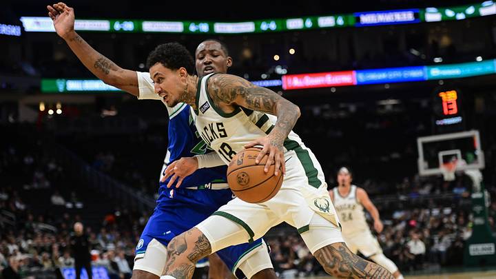 Oct 5, 2026; Milwaukee, Wisconsin, USA; Milwaukee Bucks forward Kyle Kuzma (18) drives for the basket against Minnesota Timberwolves forward Jonathan Kuminga (24) in the second quarter at Fiserv Forum. Mandatory Credit: Benny Sieu-Imagn Images Oct 5, 2026; Milwaukee, Wisconsin, USA; Milwaukee Bucks forward Kyle Kuzma (18) drives for the basket against Minnesota Timberwolves forward Jonathan Kuminga (24) in the second quarter at Fiserv Forum. Mandatory Credit: Benny Sieu-Imagn Images