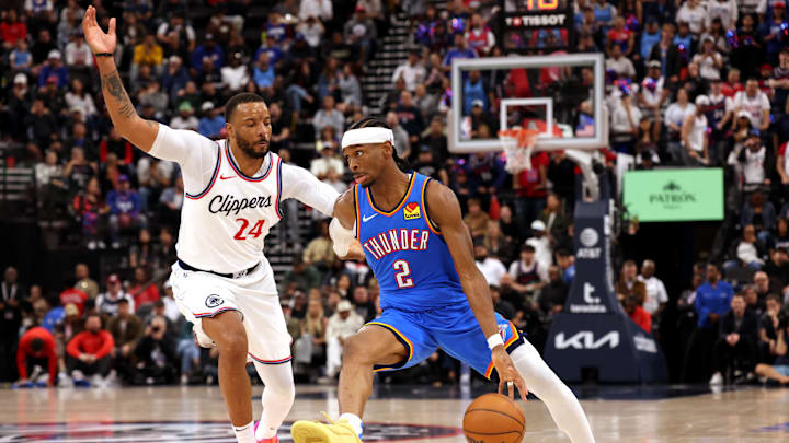 Mar 23, 2025; Inglewood, California, USA; Oklahoma City Thunder guard Shai Gilgeous-Alexander (2) drives against LA Clippers guard Norman Powell (24) during the 4th quarter at Intuit Dome. Mandatory Credit: Jason Parkhurst-Imagn Images Mar 23, 2025; Inglewood, California, USA; Oklahoma City Thunder guard Shai Gilgeous-Alexander (2) drives against LA Clippers guard Norman Powell (24) during the 4th quarter at Intuit Dome. Mandatory Credit: Jason Parkhurst-Imagn Images