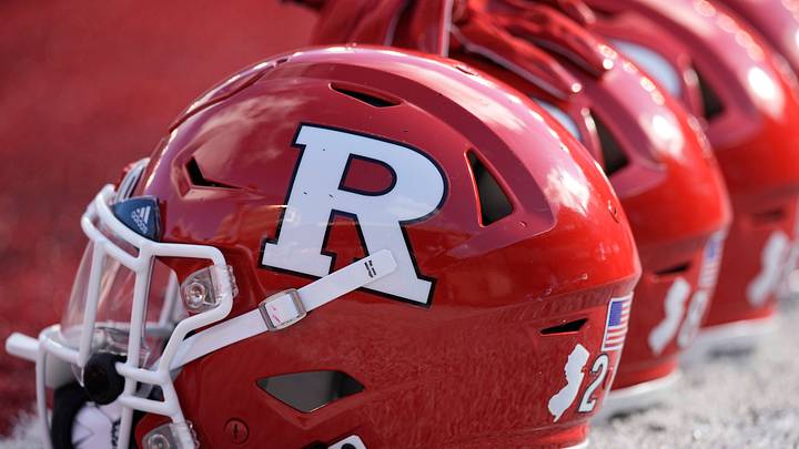 Oct 7, 2023; Madison, Wisconsin, USA; Rutgers Scarlet Knights football helmets sit on the field during warmups prior to the game against the Wisconsin Badgers at Camp Randall Stadium. Mandatory Credit: Jeff Hanisch-USA TODAY Sports Oct 7, 2023; Madison, Wisconsin, USA; Rutgers Scarlet Knights football helmets sit on the field during warmups prior to the game against the Wisconsin Badgers at Camp Randall Stadium. Mandatory Credit: Jeff Hanisch-USA TODAY Sports