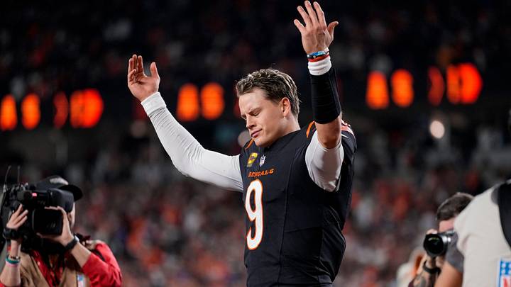 Cincinnati Bengals quarterback Joe Burrow (9) celebrates after the game-winning touchdown pass to Tee Higgins in overtime of the NFL Week 17 game between the Cincinnati Bengals and the Denver Broncos at Paycor Stadium in downtown Cincinnati on Saturday, Dec. 28, 2024. The Bengals took a 30-24 win in overtime to remain in the post season chase.