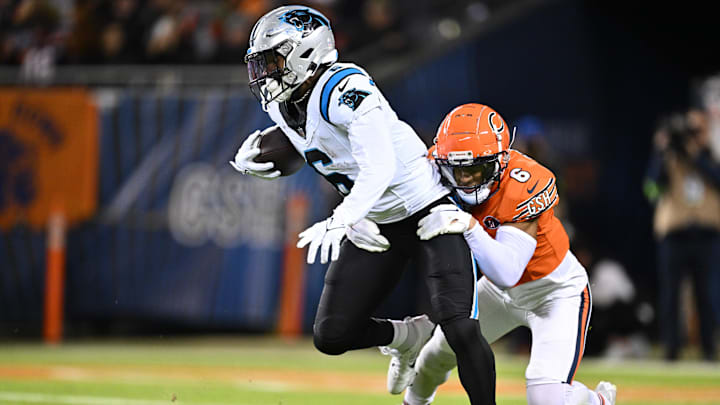 Bears cornerback Kyler Gordon hauls down running back Miles Sanders on a pass in last year's 16-13 Bears win. Bears cornerback Kyler Gordon hauls down running back Miles Sanders on a pass in last year's 16-13 Bears win.