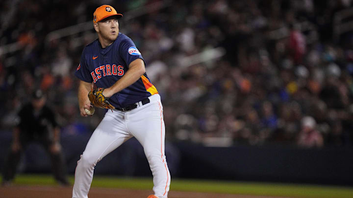 Mar 16, 2024; West Palm Beach, Florida, USA;  Houston Astros relief pitcher Ryan Gusto (98) pitches in the sixth inning against the New York Mets at CACTI Park of the Palm Beaches. 