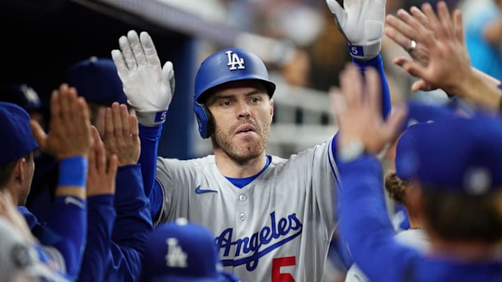 Los Angeles Dodgers first baseman Freddie Freeman (5) celebrates after hitting a home run against the Miami Marlins at loanDepot Park. 