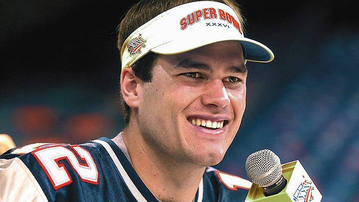 In 2002, Tom Brady at media day at the New Orleans Superdome as both the New England Patriots and the St. Louis Rams answered questions from media personnel 