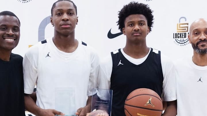 Qayden Samuels, second from right, has been a targeted recruit by the UW. 