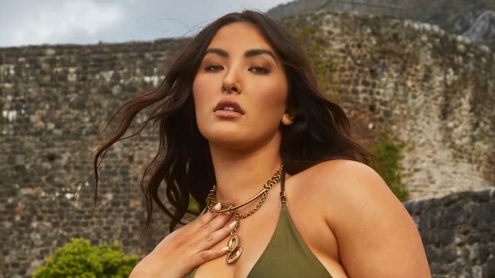 Yumi Nu was photographed by James Macari in Montenegro. Swimsuit by Ola Vida. Necklace by Michelle Ross.