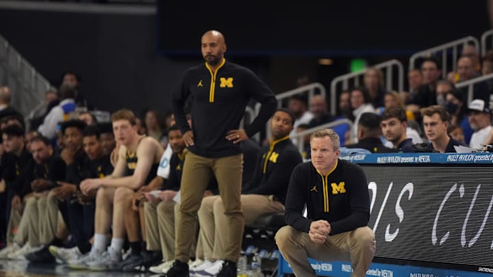 Jan 7, 2025; Los Angeles, California, USA; Michigan Wolverines head coach Dusty May and assistant coach Justin Joyner in the second half against the UCLA Bruins at Pauley Pavilion presented by Wescom. Mandatory Credit: Kirby Lee-Imagn Images