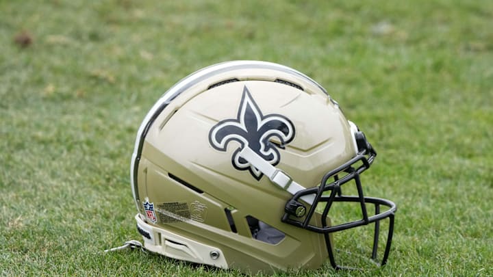 Aug 14, 2025; Carson, CA, USA; A New Orleans Saints helmet on the field during a joint practice against the Los Angeles Rams at the Dignity Health Sports Park. Mandatory Credit: Kirby Lee-Imagn Images
