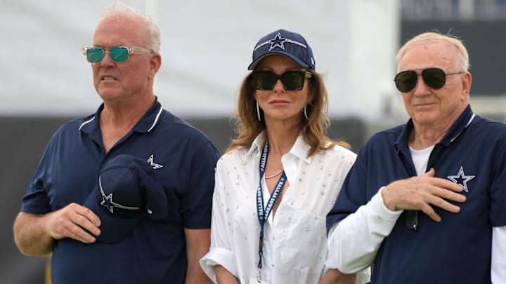 Jul 29, 2023; Oxnard, CA, USA; Dallas Cowboys chief operating officer Stephen Jones (left) and chief brand officer Charlotte Jones (center) and owner Jerry Jones during training camp opening ceremonies at the River Ridge Fields. Mandatory Credit: Kirby Lee-USA TODAY Sports