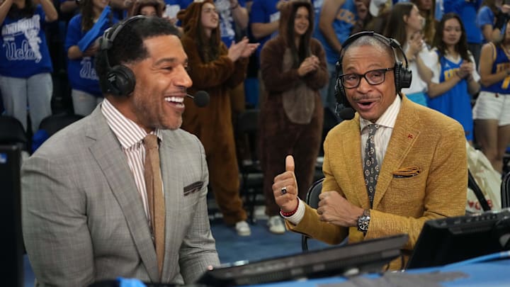 Mar 8, 2025; Los Angeles, California, USA; Fox Sports analyst Jim Jackson (left) and play-by-play announcer Gus Johnson during a game between the UCLA Bruins and the Southern California Trojans at Pauley Pavilion presented by Wescom. Mandatory Credit: Kirby Lee-Imagn Images