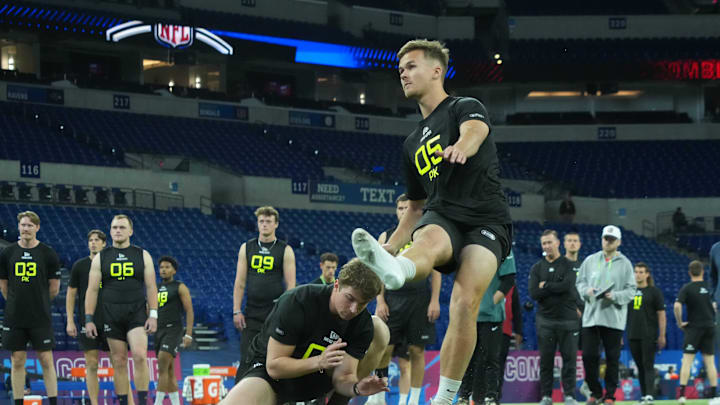 Feb 26, 2025; Indianapolis, IN, USA; Arizona place kicker Tyler Loop (PK05) kicks a field goal during workouts at the 2025 NFL Scouting Combine at Lucas Oil Stadium. Mandatory Credit: Kirby Lee-Imagn Images