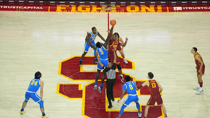 Jan 26, 2023; Los Angeles, California, USA;The opening tipoff between UCLA Bruins forward Adem Bona