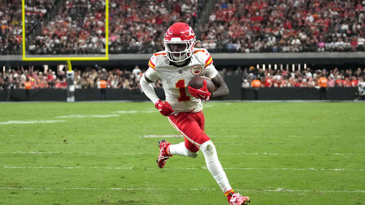 Oct 27, 2024; Paradise, Nevada, USA; Kansas City Chiefs wide receiver Xavier Worthy (1) scores on a 9-yard touchdown reception against the Las Vegas Raiders in the second half at Allegiant Stadium. Mandatory Credit: Kirby Lee-Imagn Images