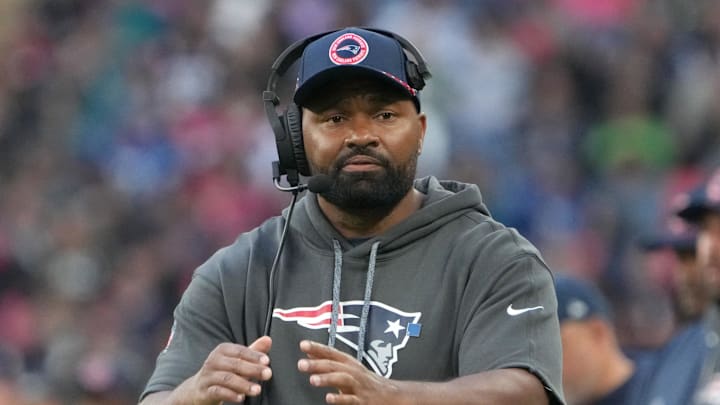 Oct 20, 2024; London, United Kingdom; New England Patriots coach Jerod Mayo watches from the sidelines against the New England Patriots in the second half of an NFL International Series game at Wembley Stadium. Mandatory Credit: Kirby Lee-Imagn Images