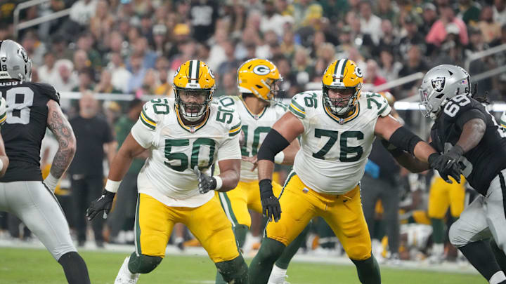Oct 9, 2023; Paradise, Nevada, USA; Green Bay Packers guard Zach Tom (50) and guard Jon Runyan (76) against the Las Vegas Raiders in the first half at Allegiant Stadium. Mandatory Credit: Kirby Lee-Imagn Images