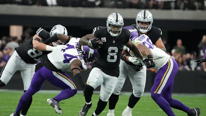 Dec 10, 2023; Paradise, Nevada, USA; Las Vegas Raiders running back Josh Jacobs (8) carries the ball