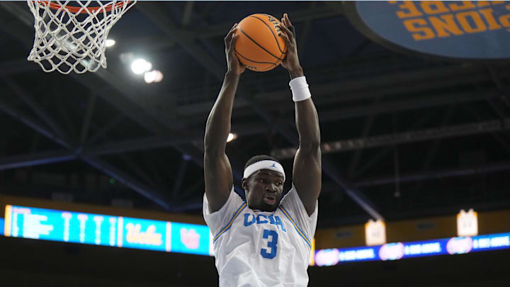 Feb 18, 2024; Los Angeles, California, USA; UCLA Bruins forward Adem Bona (3) rebounds the ball against Utah Utes in the first half at Pauley Pavilion presented by Wescom. Mandatory Credit: Kirby Lee-USA TODAY Sports
