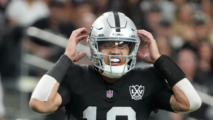 Oct 27, 2024; Paradise, Nevada, USA; Las Vegas Raiders quarterback Desmond Ridder (10) prepares to take the snap against the Kansas City Chiefs in the second half at Allegiant Stadium. Mandatory Credit: Kirby Lee-Imagn Images