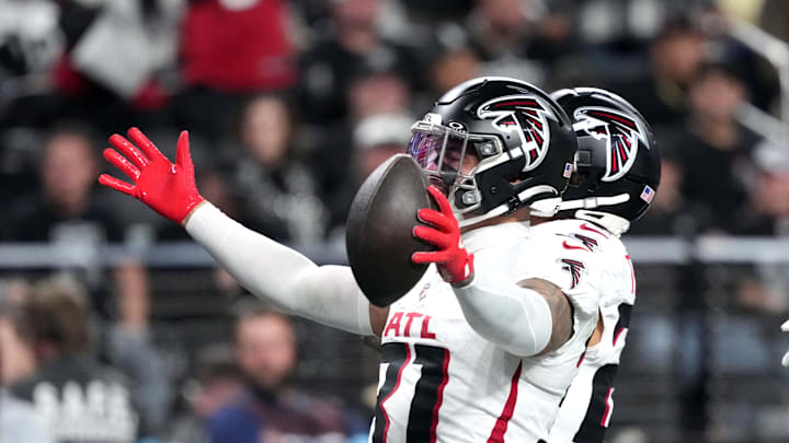 Dec 16, 2024; Paradise, Nevada, USA; Atlanta Falcons safety Justin Simmons (31) celebrates after intercepting a pass against the Las Vegas Raiders in the second half at Allegiant Stadium. Mandatory Credit: Kirby Lee-Imagn Images