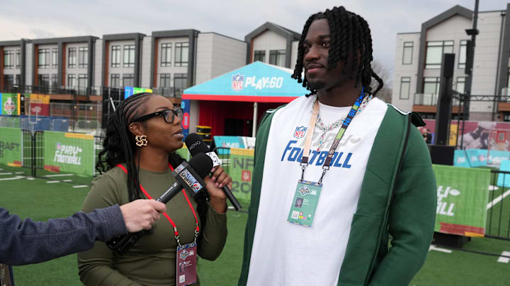 Apr 23, 2025; Green Bay, WI, USA; Texas A&M defensive end Shemar Stewart (right) is interviewed by New Era Prep reporter Cassandra Clayton during the NFL Draft prospect clinic with Special Olympics at Draft Experience Field at Titletown. Mandatory Credit: Kirby Lee-Imagn Images