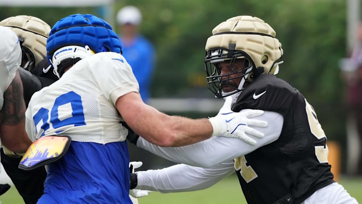 Aug 14, 2025; Carson, CA, USA; New Orleans Saints defensive end Cameron Jordan (94) rushes against Los Angeles Rams tight end Tyler Higbee (89) during a joint practice at the Dignity Health Sports Park. Mandatory Credit: Kirby Lee-Imagn Images