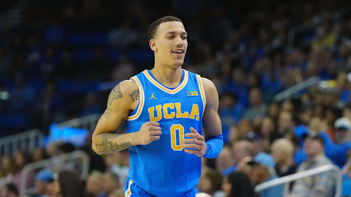 Mar 8, 2025; Los Angeles, California, USA; UCLA Bruins guard Kobe Johnson (0) reacts in the second half against the Southern California Trojans at Pauley Pavilion presented by Wescom. Mandatory Credit: Kirby Lee-Imagn Images