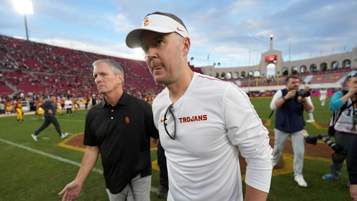 Nov 30, 2024; Los Angeles, California, USA; Southern California Trojans head coach Lincoln Riley leaves the field after the game against the Notre Dame Fighting Irish at United Airlines Field at Los Angeles Memorial Coliseum. Mandatory Credit: Kirby Lee-Imagn Images