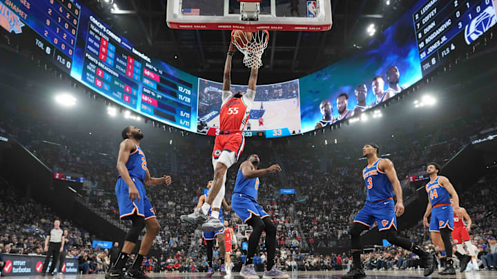 Mar 7, 2025; Inglewood, California, USA; LA Clippers forward Derrick Jones Jr. (55) attempts to dunk the ball against the New York Knicks in the first half at Intuit Dome. Mandatory Credit: Kirby Lee-Imagn Images