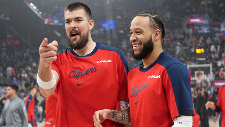 Mar 7, 2025; Inglewood, California, USA; LA Clippers center Ivica Zubac (left) and guard Amir Coffey before the game against the New York Knicks at the Intuit Dome. Mandatory Credit: Kirby Lee-Imagn Images