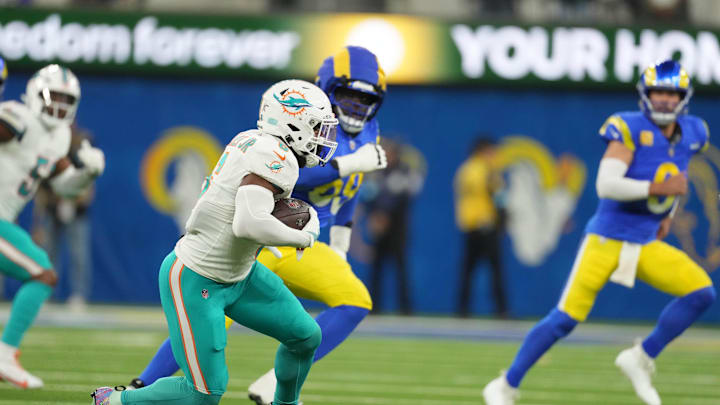 Nov 11, 2024; Inglewood, California, USA; Miami Dolphins linebacker Anthony Walker Jr. (6) carries the ball on an interception return against the Los Angeles Rams in the first half at SoFi Stadium. Nov 11, 2024; Inglewood, California, USA; Miami Dolphins linebacker Anthony Walker Jr. (6) carries the ball on an interception return against the Los Angeles Rams in the first half at SoFi Stadium.