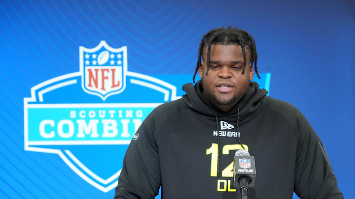 Michigan defensive lineman Kenneth Grant (DL12) during the 2025 NFL Scouting Combine at the Indiana Convention Center. 