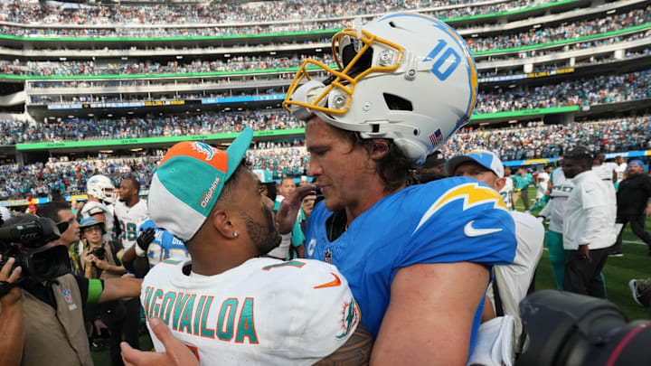 Miami Dolphins quarterback Tua Tagovailoa (1) and Los Angeles Chargers quarterback Justin Herbert (10) shake hands after the game at SoFi Stadium in 2023. Miami Dolphins quarterback Tua Tagovailoa (1) and Los Angeles Chargers quarterback Justin Herbert (10) shake hands after the game at SoFi Stadium in 2023.