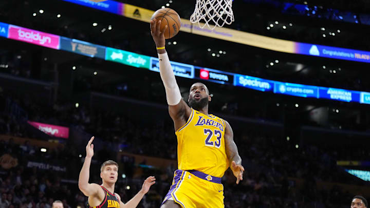 Mar 18, 2024; Los Angeles, California, USA; Los Angeles Lakers forward LeBron James (23) shoots the ball against the Atlanta Hawks in the second half at Crypto.com Arena. Mandatory Credit: Kirby Lee-Imagn Images