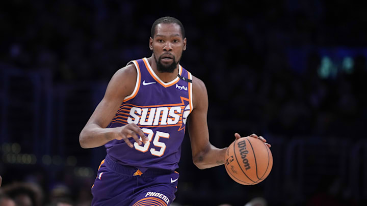 Mar 16, 2025; Los Angeles, California, USA; Phoenix Suns forward Kevin Durant (35) dribbles the ball against the Los Angeles Lakers in the second half at Crypto.com Arena. Mandatory Credit: Kirby Lee-Imagn Images